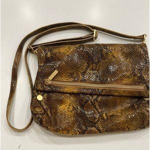 Zippered leather crossbody clutch